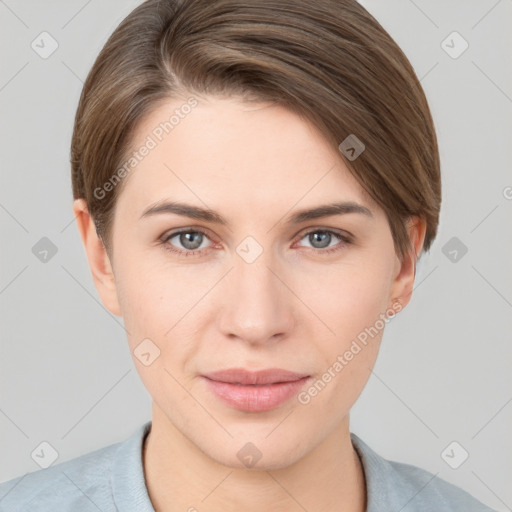 Joyful white young-adult female with short  brown hair and grey eyes