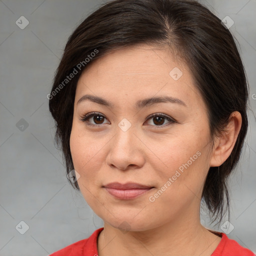 Joyful white adult female with medium  brown hair and brown eyes