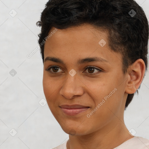 Joyful latino young-adult female with short  brown hair and brown eyes