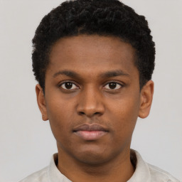Neutral latino young-adult male with short  brown hair and brown eyes
