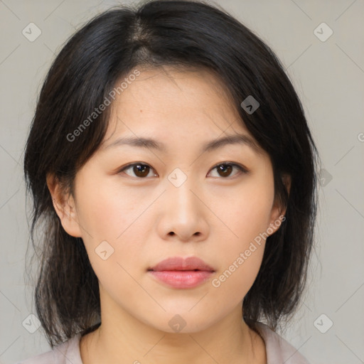 Neutral asian young-adult female with medium  brown hair and brown eyes