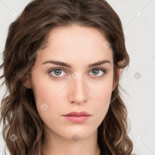 Neutral white young-adult female with long  brown hair and brown eyes