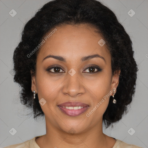 Joyful black young-adult female with long  brown hair and brown eyes