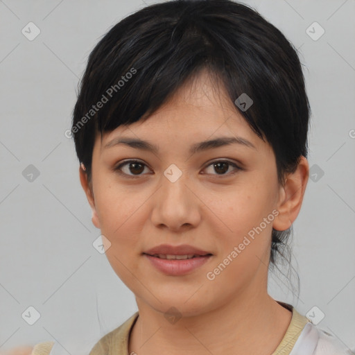 Joyful asian young-adult female with medium  black hair and brown eyes