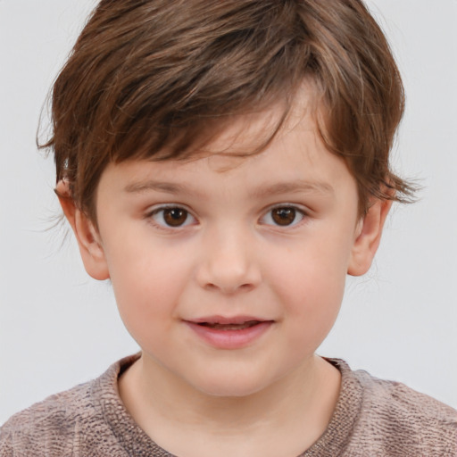 Joyful white child male with short  brown hair and brown eyes