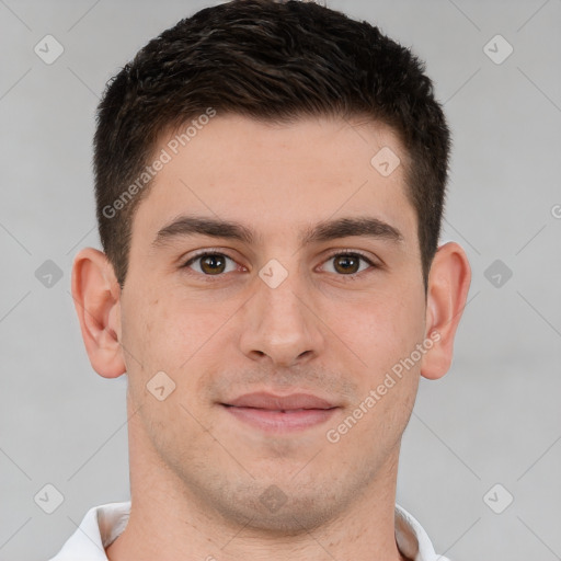 Joyful white young-adult male with short  brown hair and brown eyes