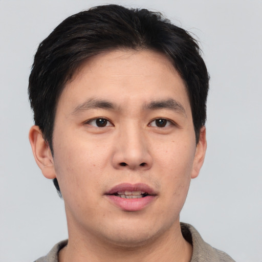 Neutral asian young-adult male with short  brown hair and brown eyes