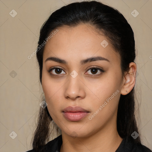 Neutral latino young-adult female with long  brown hair and brown eyes