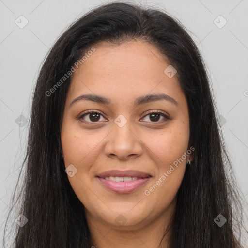 Joyful latino young-adult female with long  brown hair and brown eyes