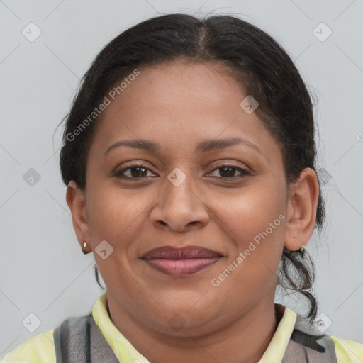 Joyful latino adult female with short  brown hair and brown eyes