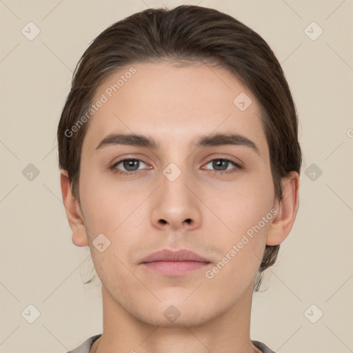 Neutral white young-adult male with short  brown hair and brown eyes