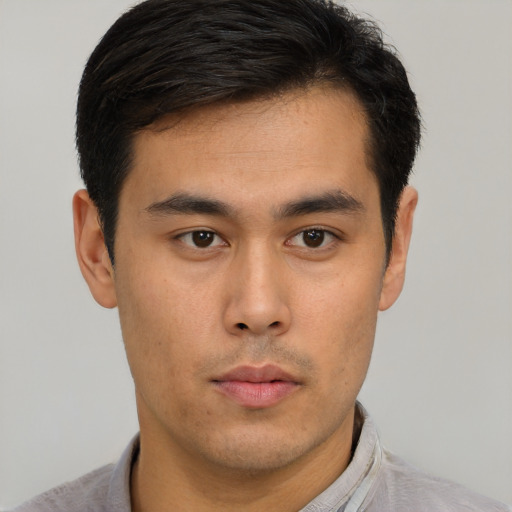 Neutral asian young-adult male with short  brown hair and brown eyes