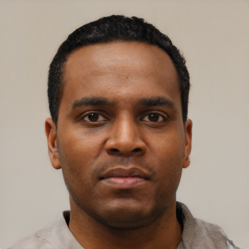 Neutral black young-adult male with short  black hair and brown eyes