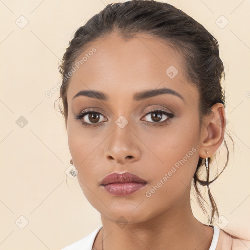 Neutral white young-adult female with medium  brown hair and brown eyes