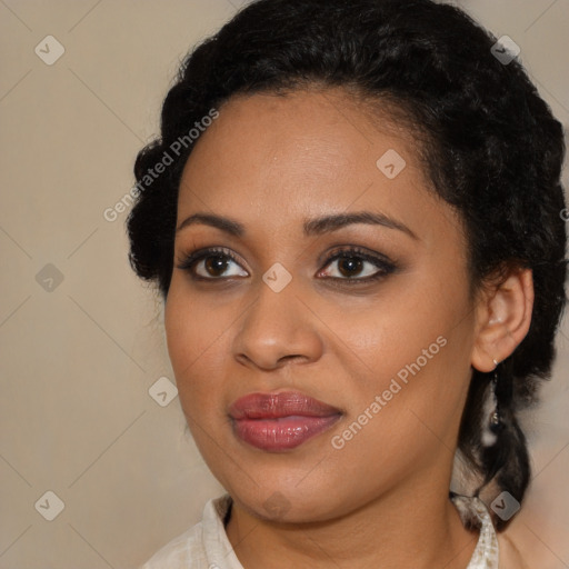 Joyful black young-adult female with medium  brown hair and brown eyes