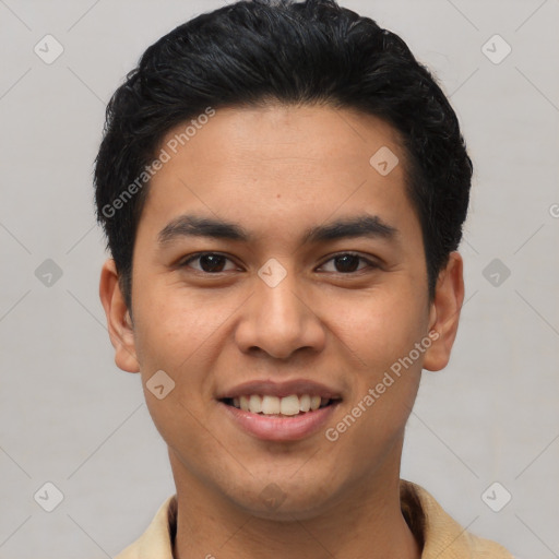 Joyful latino young-adult male with short  black hair and brown eyes