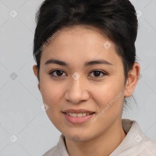 Joyful asian young-adult female with short  brown hair and brown eyes