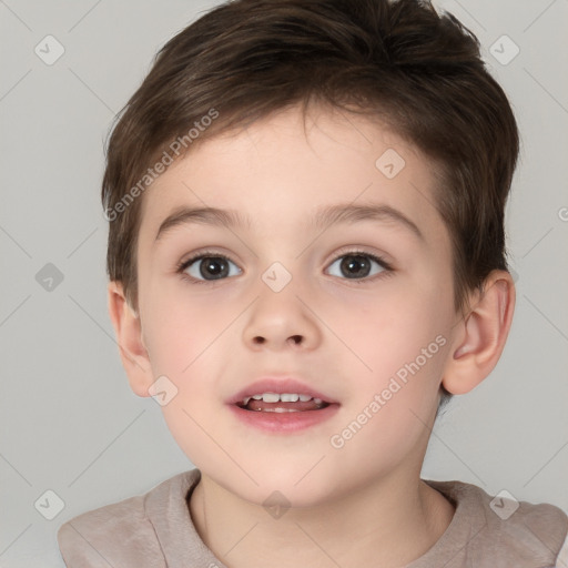 Joyful white child male with short  brown hair and brown eyes