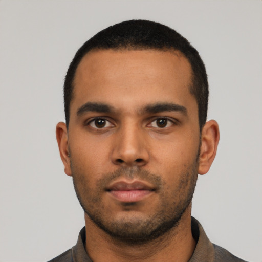 Neutral latino young-adult male with short  black hair and brown eyes