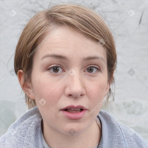 Joyful white young-adult female with medium  brown hair and blue eyes