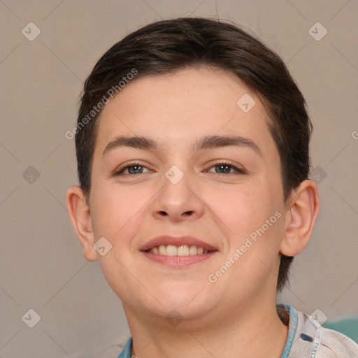 Joyful white young-adult female with short  brown hair and brown eyes