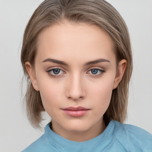 Neutral white young-adult female with medium  brown hair and brown eyes