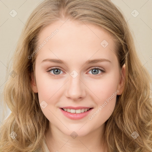 Joyful white young-adult female with long  brown hair and blue eyes