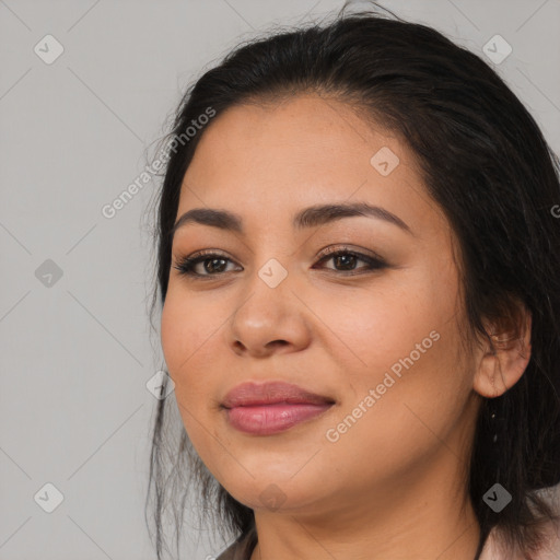 Joyful asian young-adult female with long  black hair and brown eyes