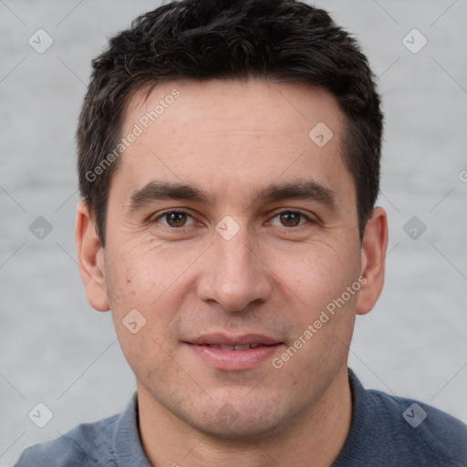 Joyful white adult male with short  brown hair and brown eyes