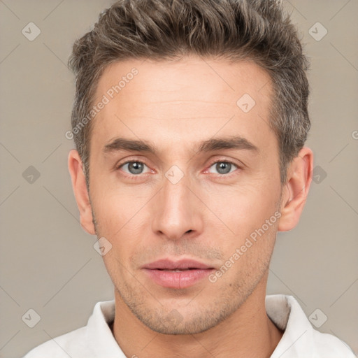 Neutral white young-adult male with short  brown hair and brown eyes