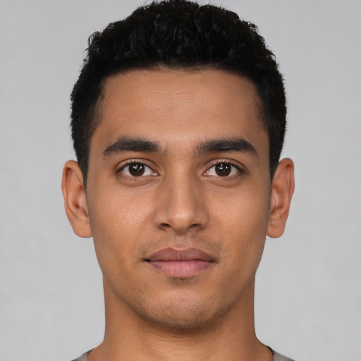 Neutral latino young-adult male with short  black hair and brown eyes
