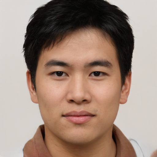 Neutral asian young-adult male with short  brown hair and brown eyes