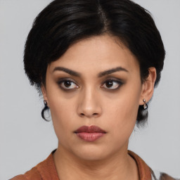 Neutral asian young-adult female with medium  black hair and brown eyes