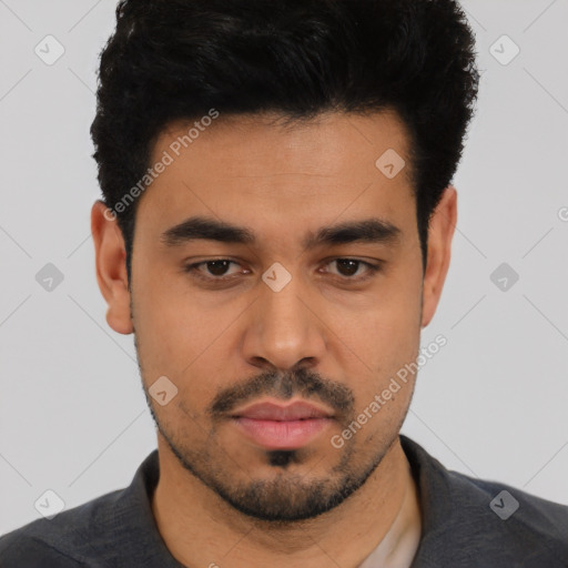 Neutral latino young-adult male with short  black hair and brown eyes