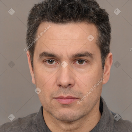 Neutral white adult male with short  brown hair and brown eyes