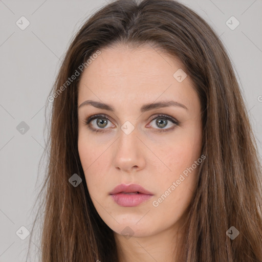 Neutral white young-adult female with long  brown hair and brown eyes