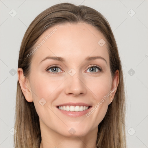 Joyful white young-adult female with long  brown hair and grey eyes