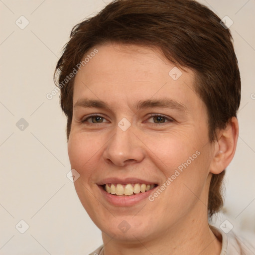 Joyful white young-adult female with short  brown hair and brown eyes