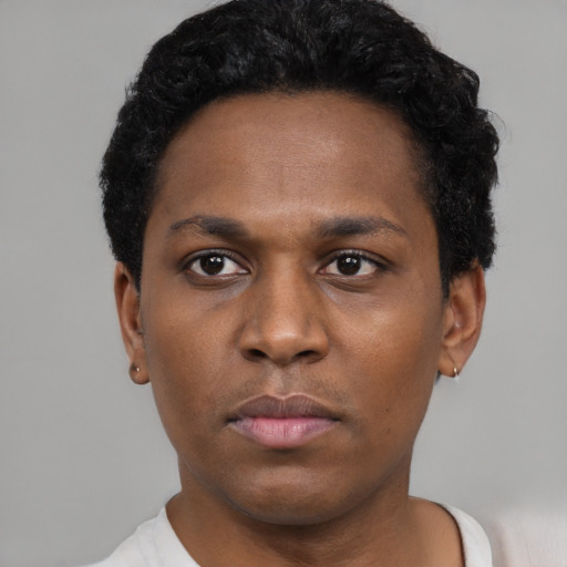 Neutral black young-adult male with short  black hair and brown eyes