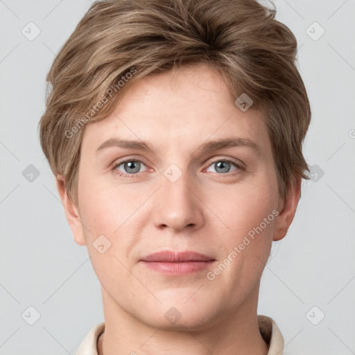 Joyful white young-adult female with short  brown hair and grey eyes