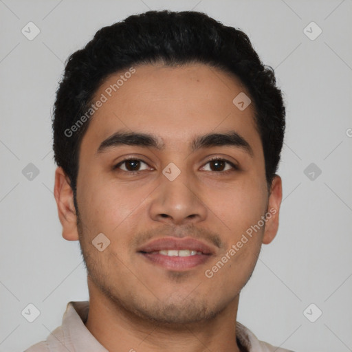 Joyful latino young-adult male with short  black hair and brown eyes