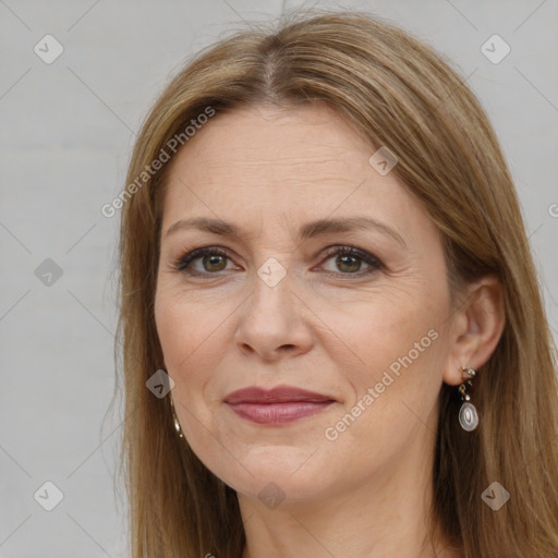 Joyful white adult female with long  brown hair and brown eyes