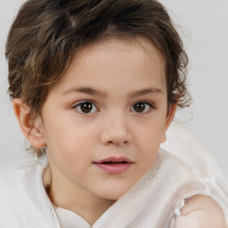 Joyful white child female with short  brown hair and brown eyes