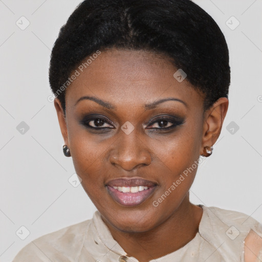 Joyful black young-adult female with short  brown hair and brown eyes