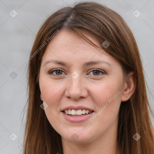 Joyful white young-adult female with long  brown hair and grey eyes