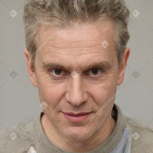 Joyful white middle-aged male with short  brown hair and brown eyes