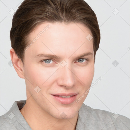 Joyful white young-adult female with short  brown hair and grey eyes