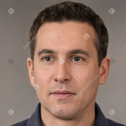 Neutral white adult male with short  brown hair and brown eyes