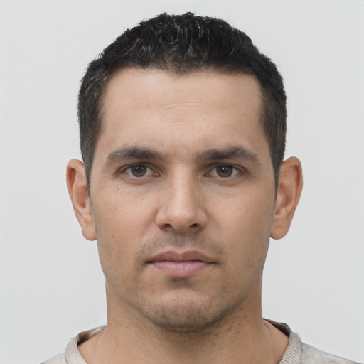 Neutral white young-adult male with short  brown hair and brown eyes