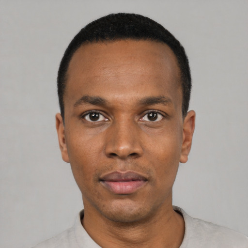 Neutral black young-adult male with short  black hair and brown eyes